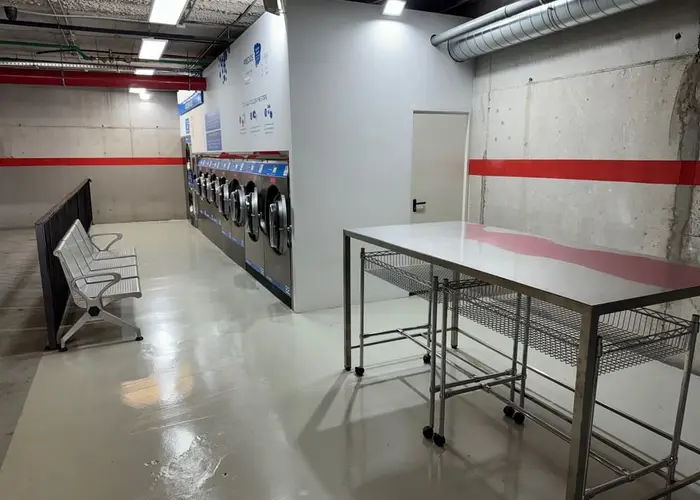 Zona de plegado de la Lavandería Azul del CC Siam Mall